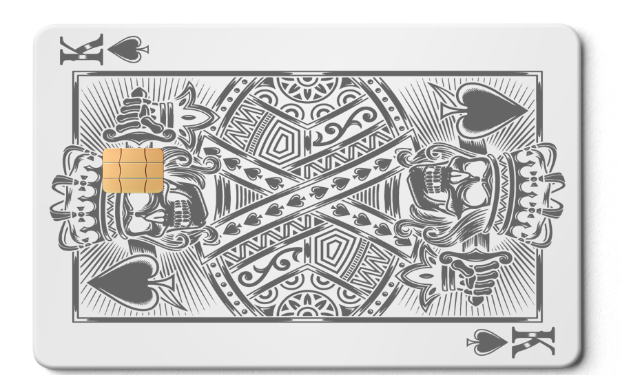 White metal card designed as King of Spades playing card with skull motif and chip