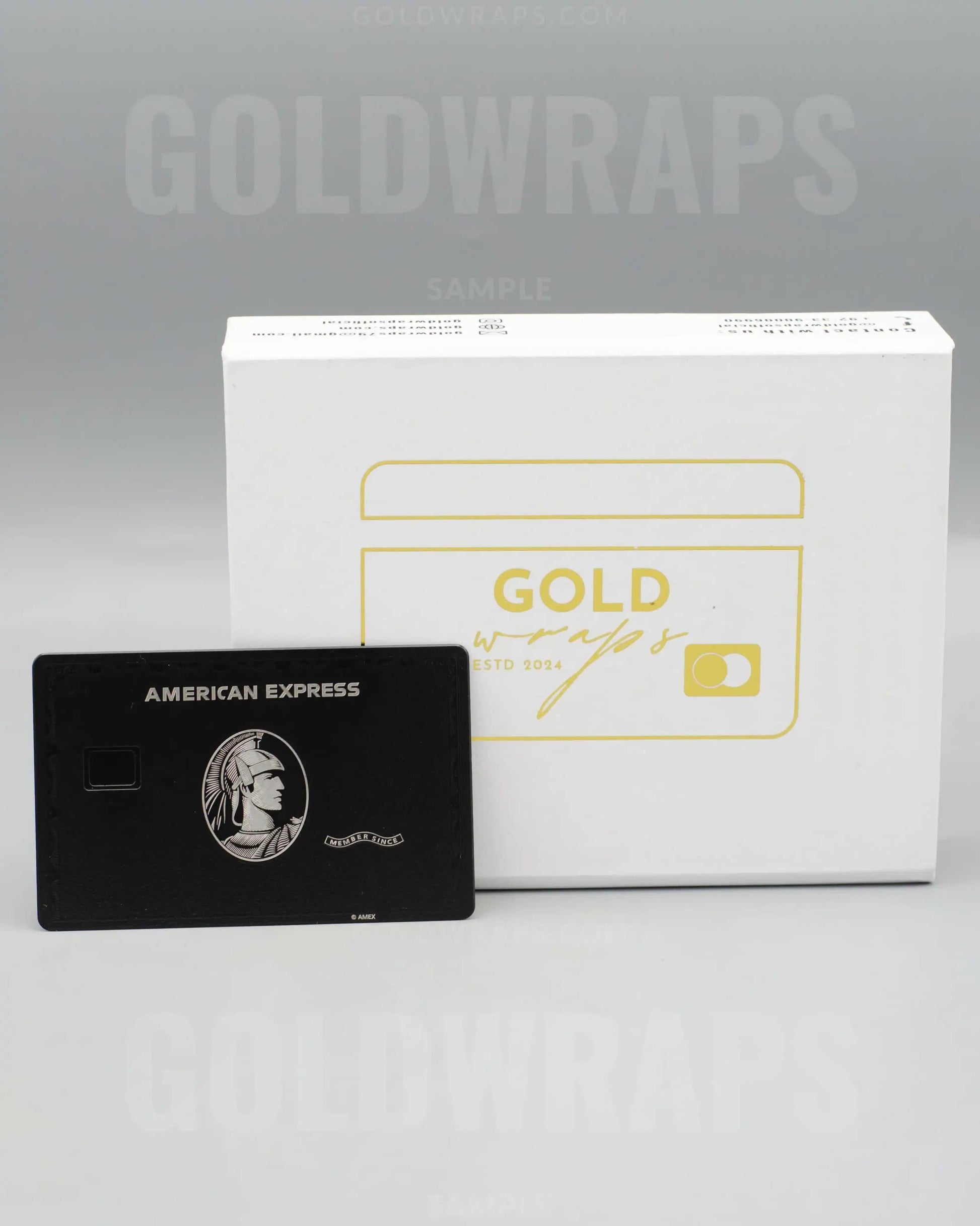 Black AMX metal card with Gold Wraps premium packaging box
