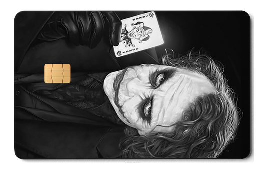 Metal card with black and white joker design, gloved hand holding a joker card