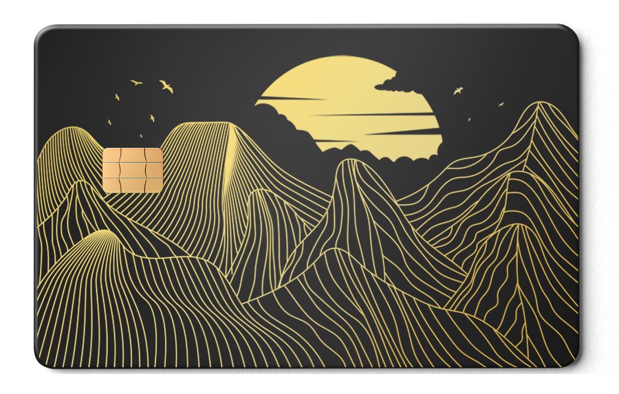 Metal card with gold mountain line art and sun design on matte black background