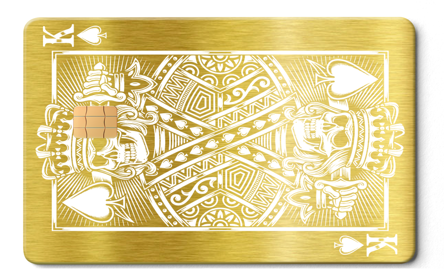 Brushed gold metal card with King of Spades skull design and white detailing