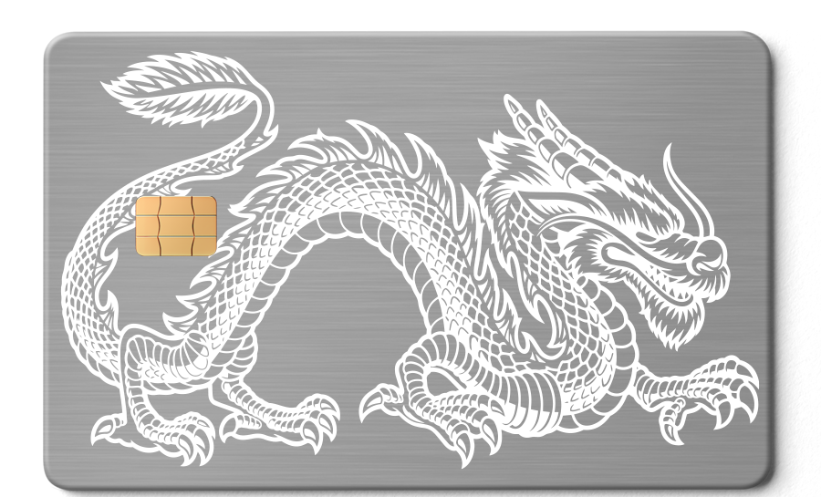 Metal card with engraved silver dragon design and gold chip on brushed surface