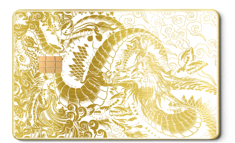 Brushed gold metal card with intricate East Asian dragon engraving and swirling clouds design