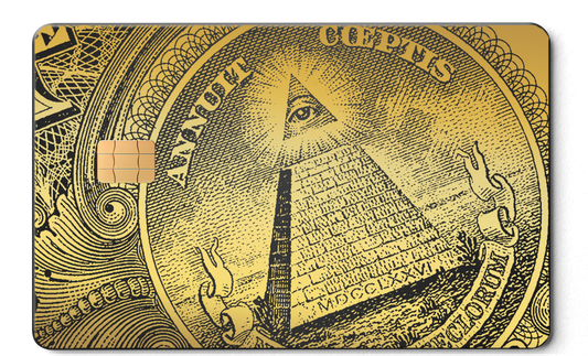 Enigma brass metal card with pyramid and all-seeing eye design, chip visible, engraved details