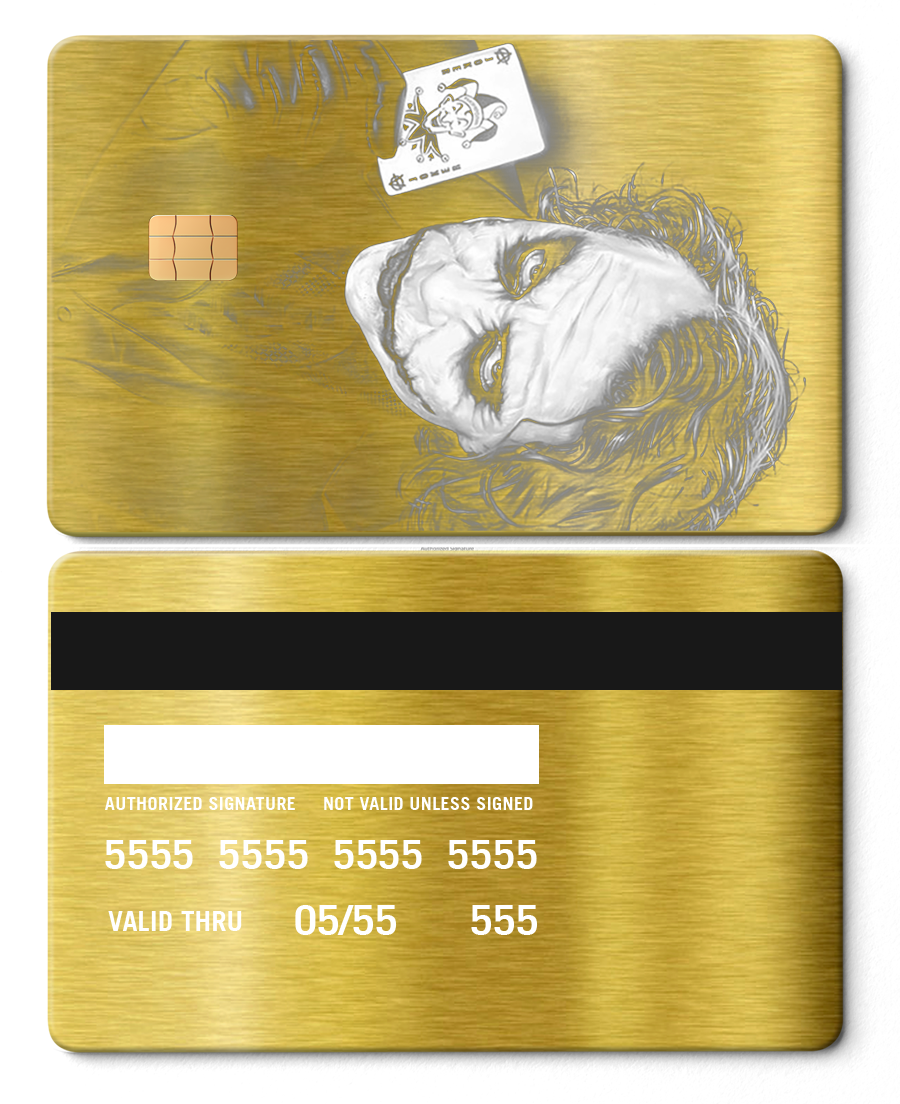 Brushed gold metal card featuring a Joker illustration and playing card design