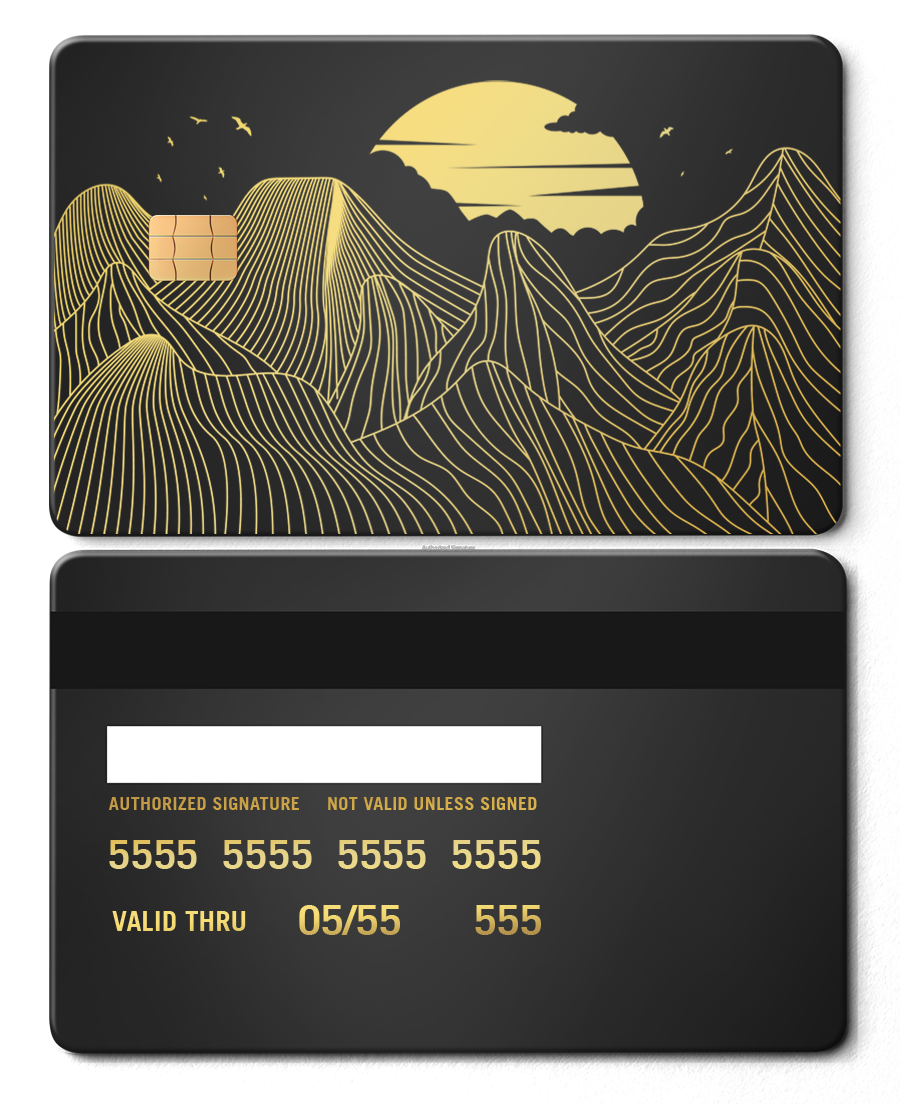 Metal card with gold mountain line art, sun, and birds on a matte black background