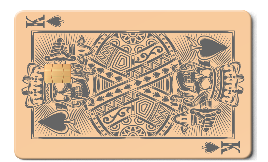 Rose gold metal card featuring King of Spades design with skull motif and smart chip