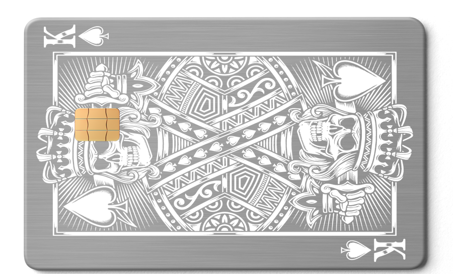 Metal King of Spades card with skeleton design and embedded chip on brushed silver finish