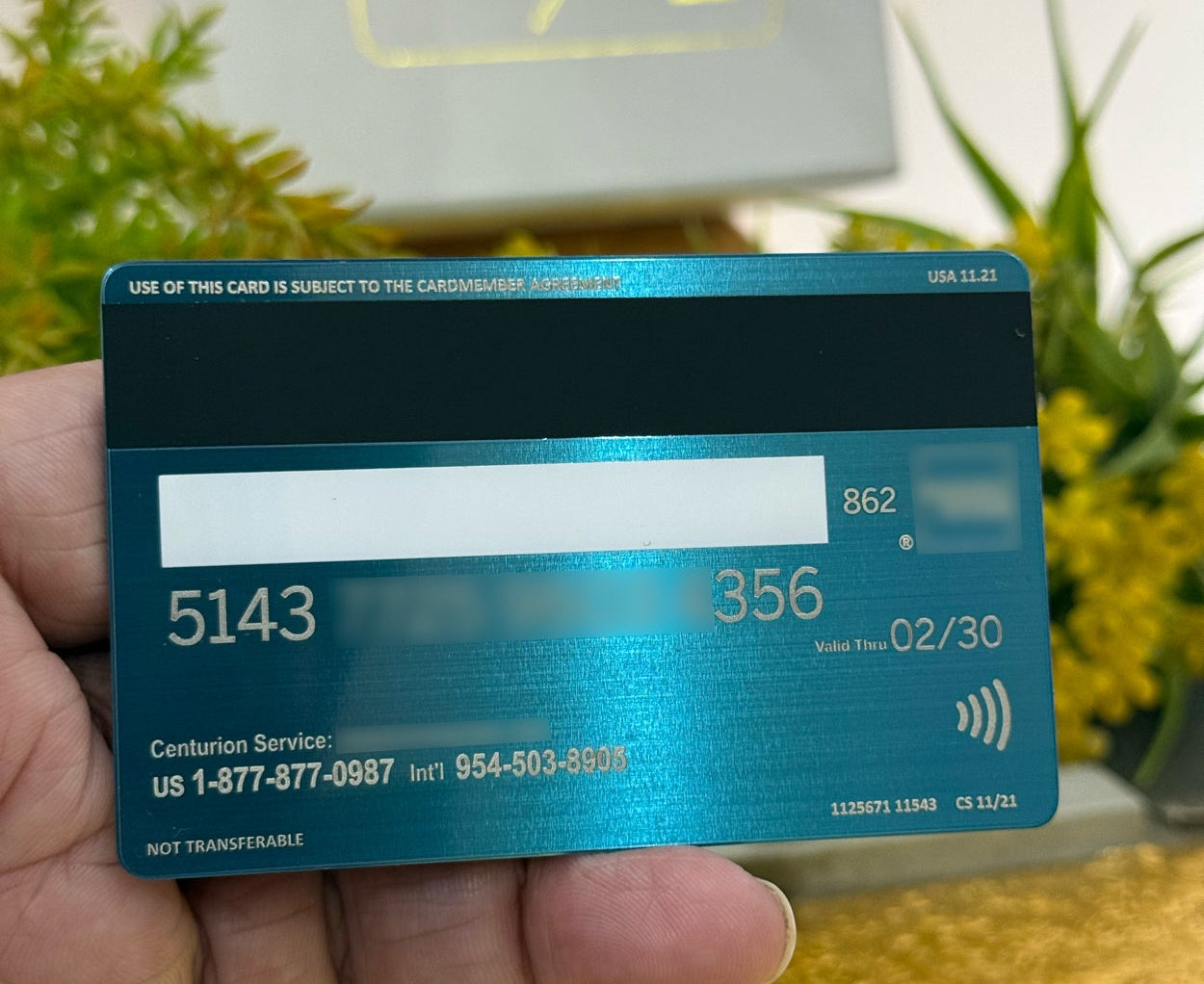 Exclusive Blue American Express metal card with sophisticated modern luxury finish