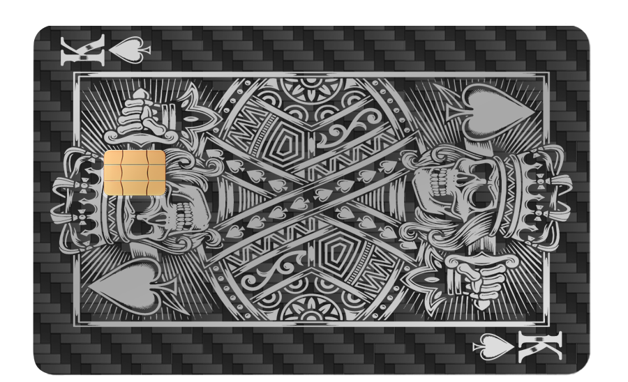 Metal credit card with carbon fiber pattern, King of Spades skull design, chip embedded