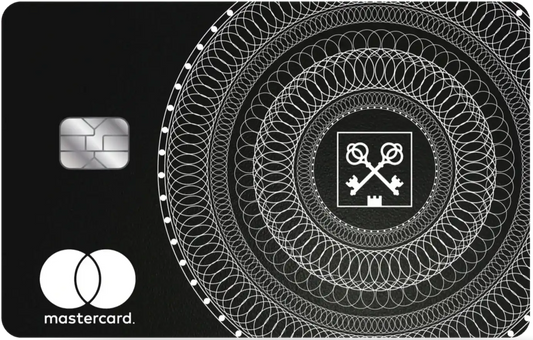 Black metal credit card with intricate white circular patterns, chip, and Mastercard logo