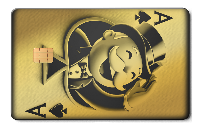 Gold metal card with embossed ace of spades design and Monopoly-style character