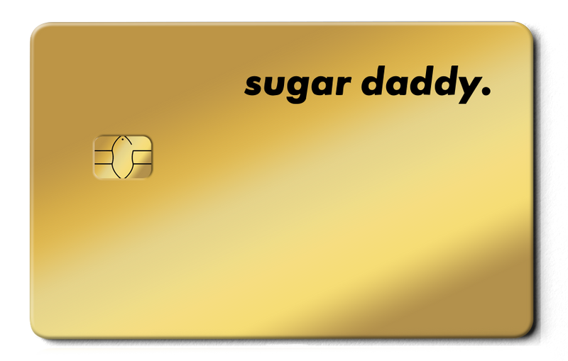Gold metal card with chip and bold sugar daddy text design